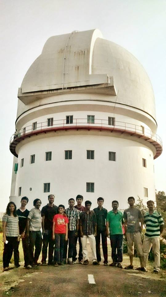 Team in front of the dome